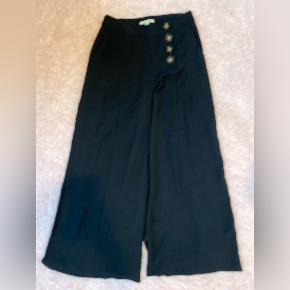 Flowy high waisted black pants with cheetah buttons